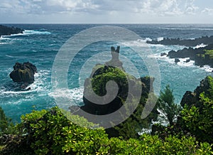 Green mountain rocks at Waianapanapa on the road to Hana in Maui