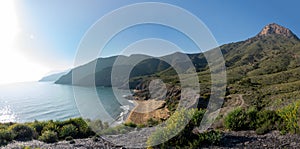 Green mountains and sandy beaches of regional park of Calblanque, Monte de las Cenizas and PeÃÂ±a del Aguila in Spain photo