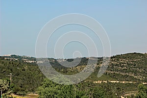 Green mountains with settlements near Jerusalem, Israel