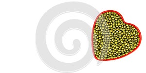 Green mung beans in red heart plate / Mung bean seed cereal whole grains isolated on white background