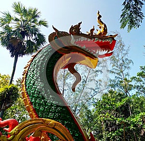 Green NaGa statue in temple