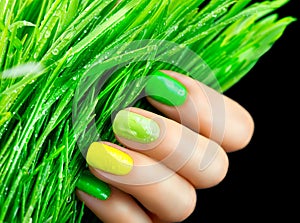 Green nails. Beautiful nailpolish with green grass