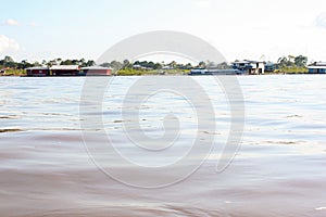 Green nature of amazon river from the boat sie of view in Leticia, Colombia