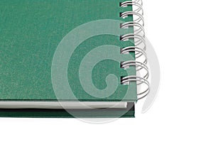Green notebook isolated on white background