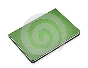 Green notebook isolated on whtie photo