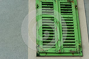 Green Old Window on a Grey wall
