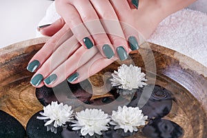 Green Olive Gel Nails: Serene Beauty Above Water