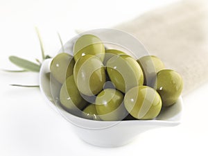 Green olives in a bowl