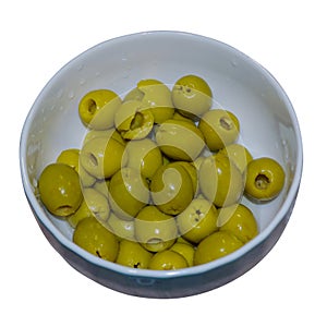 Green olives bowl isolate on white