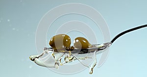 Green Olives, Olea europaea, Falling in a Spoon