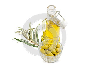 Green olives, olive oil and olive branch