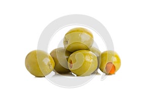 Green olives stuffed with red paprika isolated on white