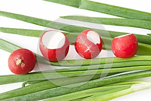 Green onions over white background