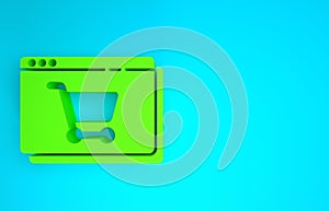 Green Online shopping on screen icon isolated on blue background. Concept e-commerce, e-business, online business