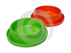 green and orange color pet feeding bowl isolated on whith background with clipping path