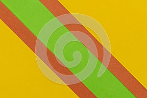 Green, Orange and Yellow coloured paper background