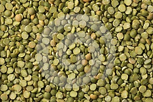 Green organic split peas close up