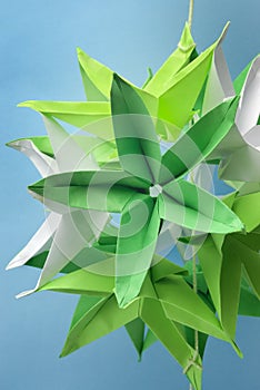 Green origami star shaped flowers
