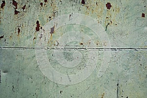 Green painted metal rusted background. Metal rust texture. Erosion metal. Scratched and dirty texture on outdoor rusted