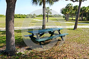 A green painted picnic table near Fort Desoto Park, St Petersburg, Florida, U.S.A