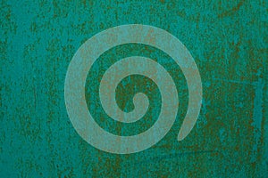 Green painted rusty iron wall background texture