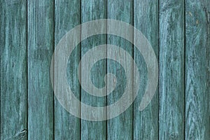 Green painted wood surface. Old wooden fence. Texture background