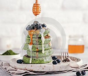 Green pancakes with matcha tea