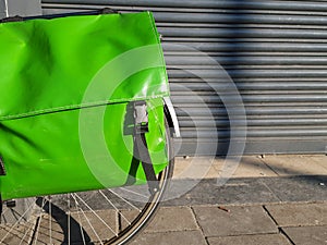 Green pannier on a bicycle