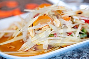 Green papaya salad. Famous Thai food or we call `Somtum`