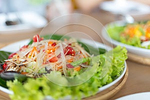 Green papaya salad Thai cuisine spicy delicious ,Papaya salad. Traditional spicy Thai food