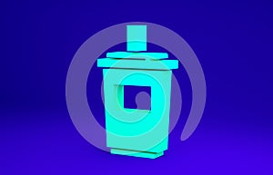 Green Paper glass with drinking straw and water icon isolated on blue background. Soda drink glass. Fresh cold beverage