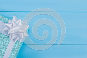 Green patterned gift box with copyspace.