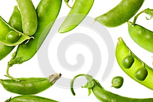 Green pea pods isolated on white background