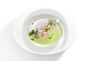 Green Pea Soup with Crab and Coconut Espuma photo