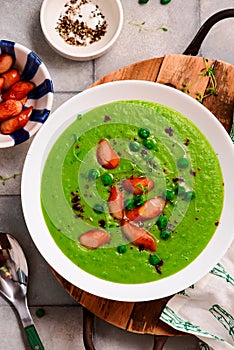 Green pea soup with sausages.style hugge.selective focus