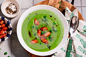 Green pea soup with sausages.style hugge.selective focus