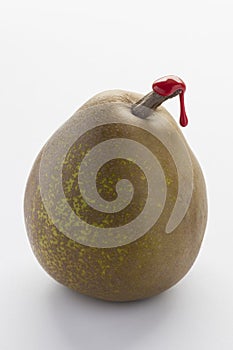 Green pear with red sealing wax