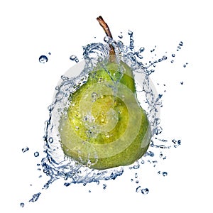 Green pear with water splash