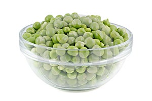 Green peas in a glass bowl.