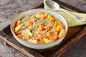 Green Peas with Ground Beef stew Kiymali Bezelye closeup on the plate. Horizontal