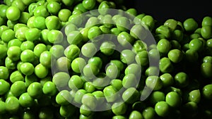 Green peas gyrating with intimate light