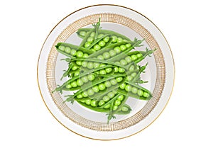 Green peas in plate isolated on white