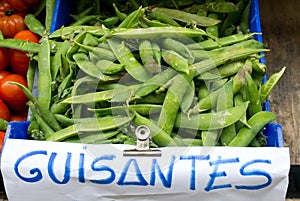 Green peas pods in a market photo