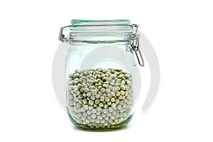 Green peas stored inside the closable glass