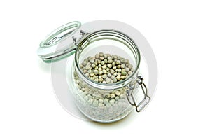 Green peas stored inside the closable glass