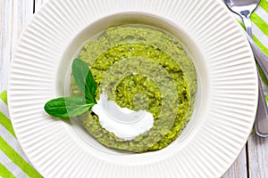 Green pease puree pudding with spinach and spices