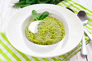 Green pease puree pudding with spinach and spices