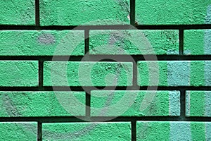 Green peint brick wall