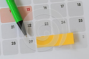 Green pen points to a Twenty-nine number of calendar and have bl