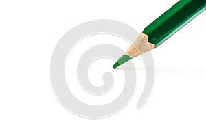 Green pencil on a white background